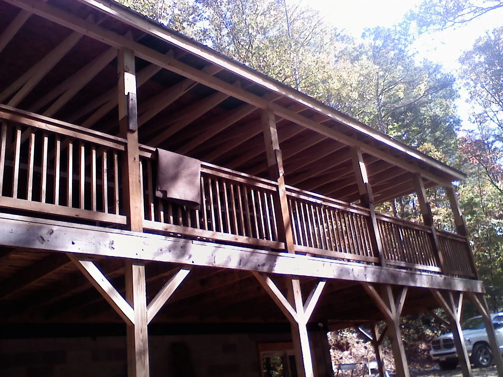 Timber framing under a new elevated porch and deck — Roof Leak Repair in Verona Beach by Roofing Brothers